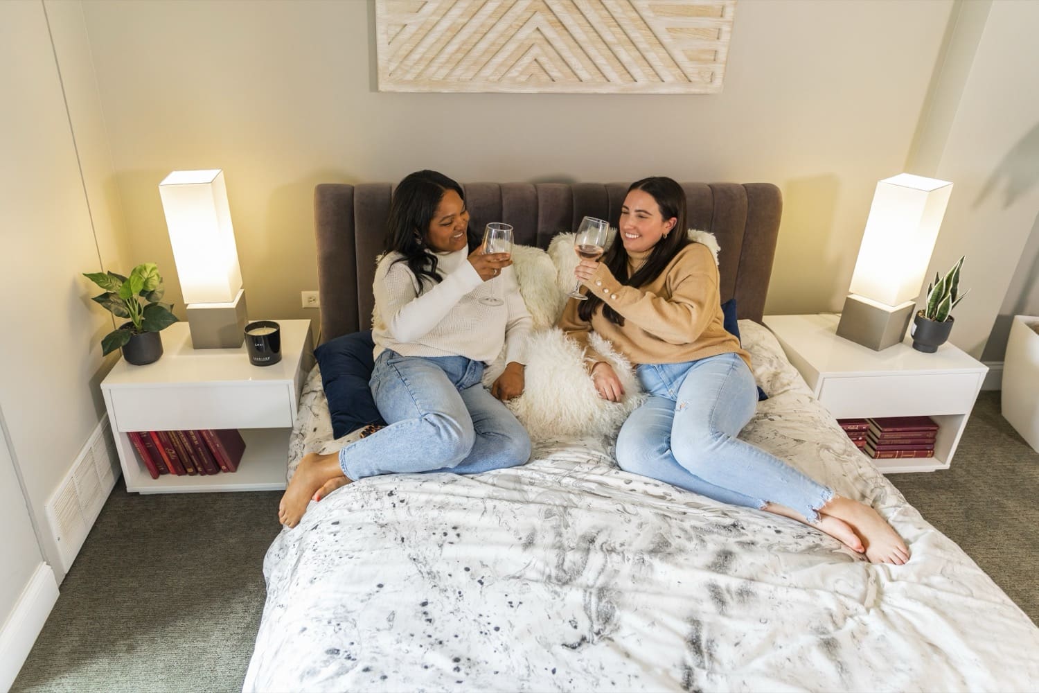 friends hanging on bed near University of Michigan